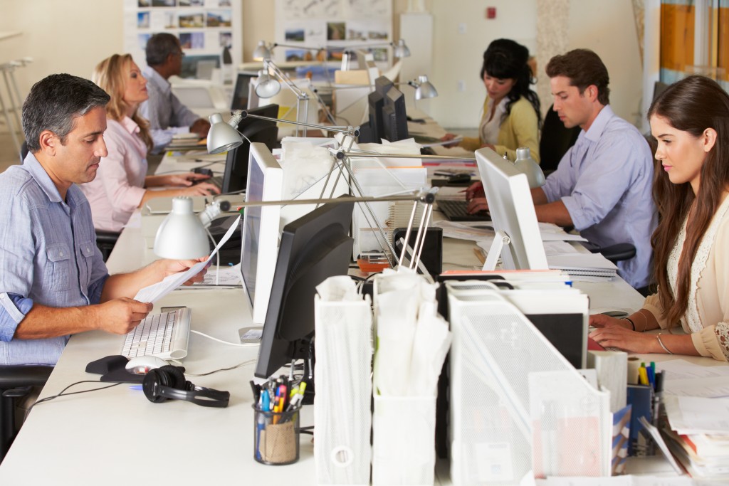 Employees working at their desks