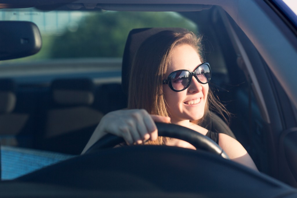 Teenager driving a car