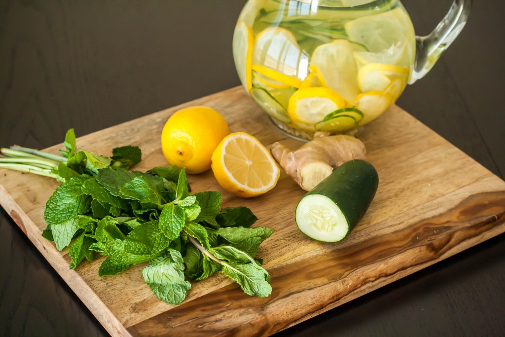 lemon and cucumber on a chopping board