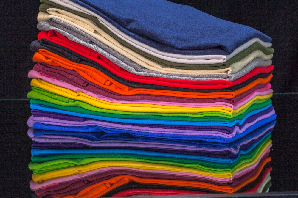 A pile of colorful shirts