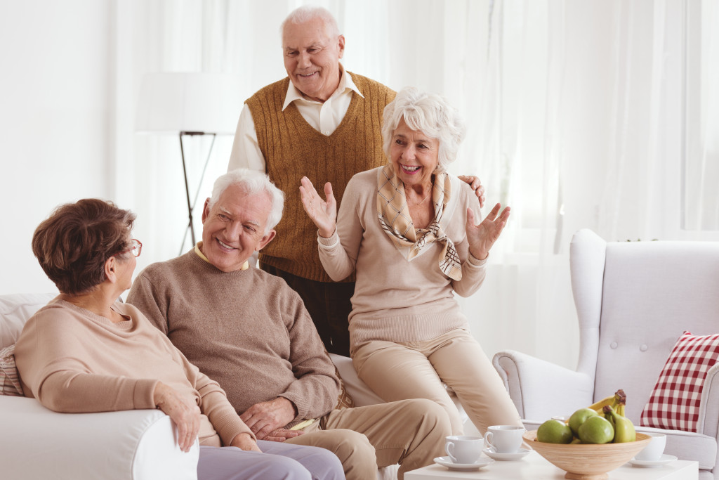 senior gathered in the living room