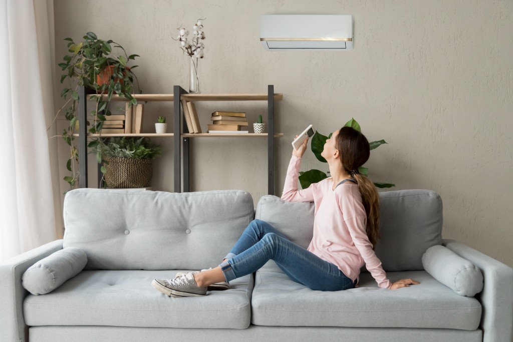 woman sitting in sofa