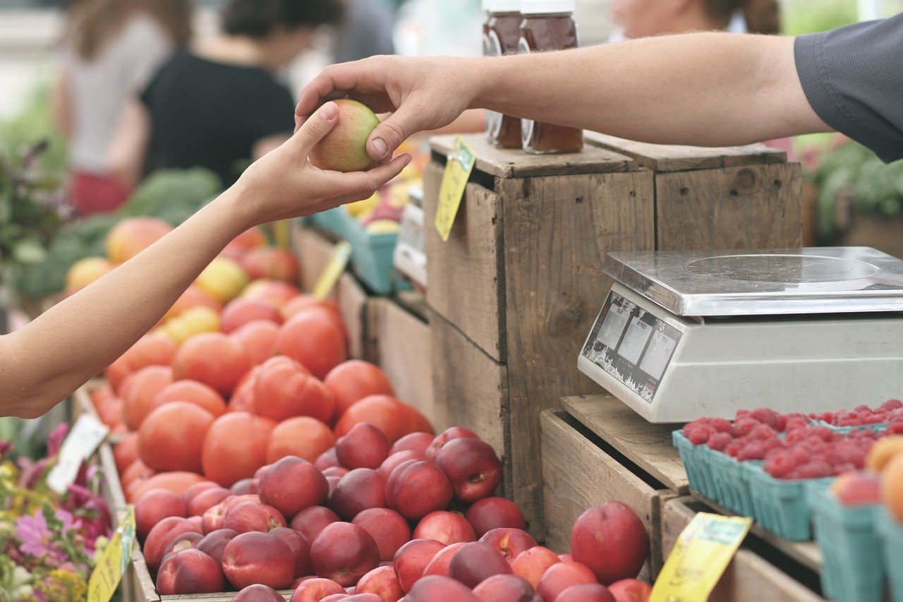 person buying apples