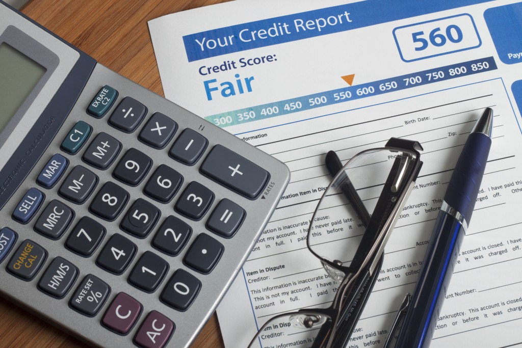 Credit report with score on a desk