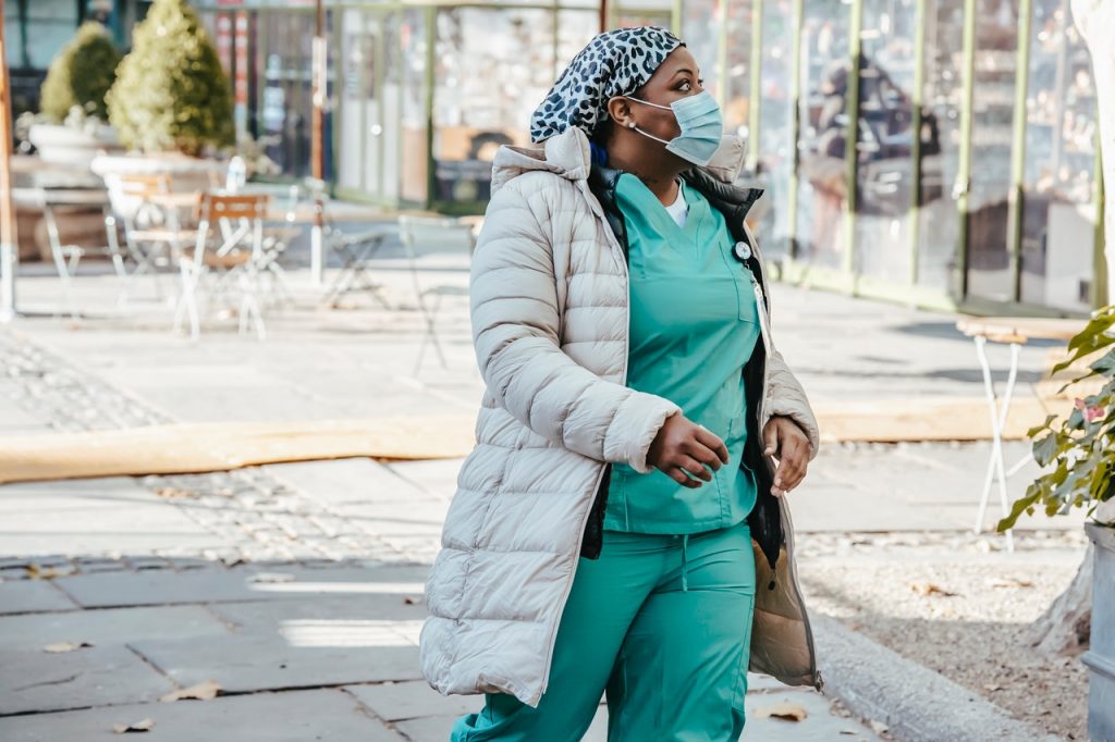 a nurse walking down the street