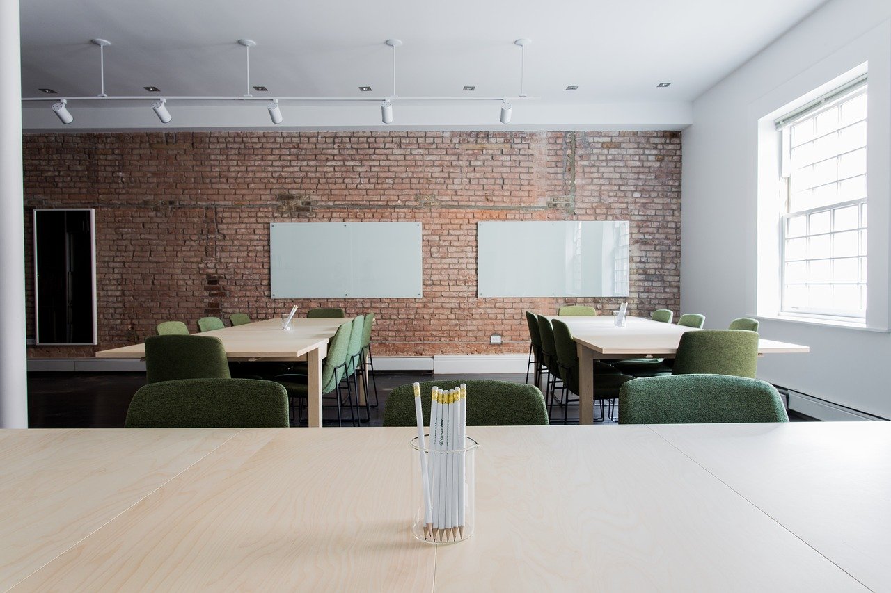 empty office with tables and chairs