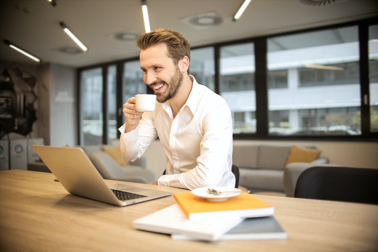 man drinking coffee