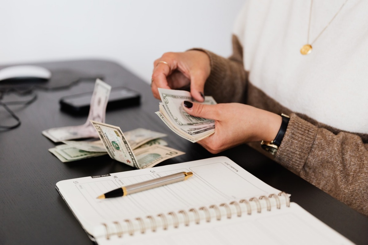 woman counting money