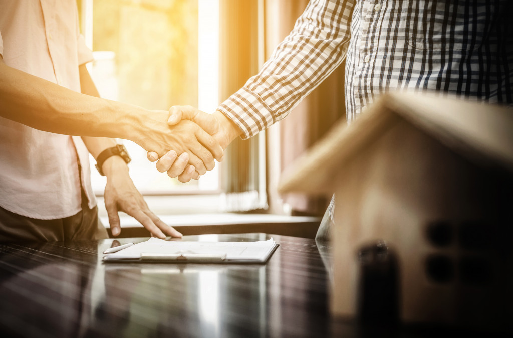 two people shaking hands