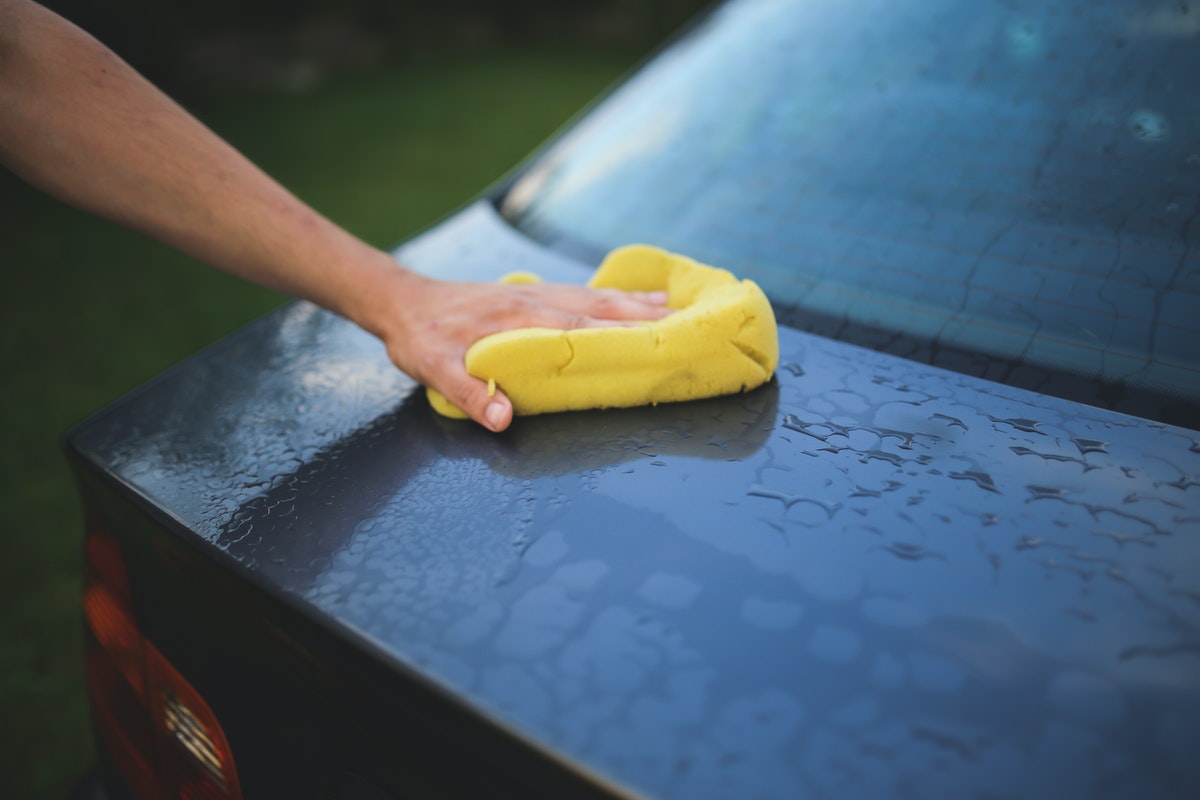 person doing a car wash