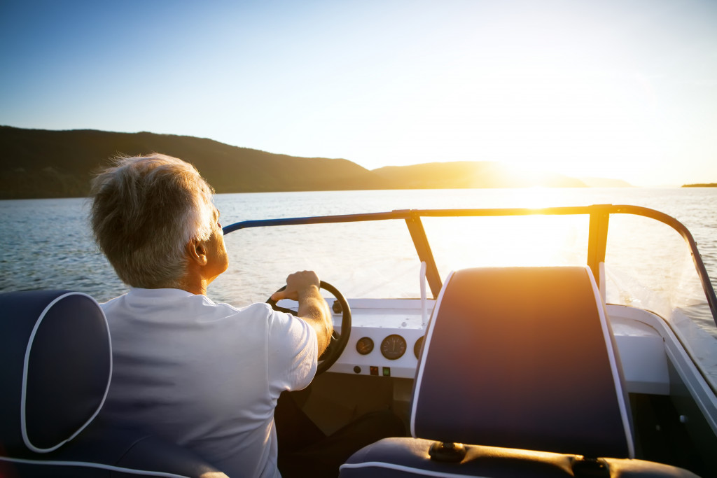 man driving a boat