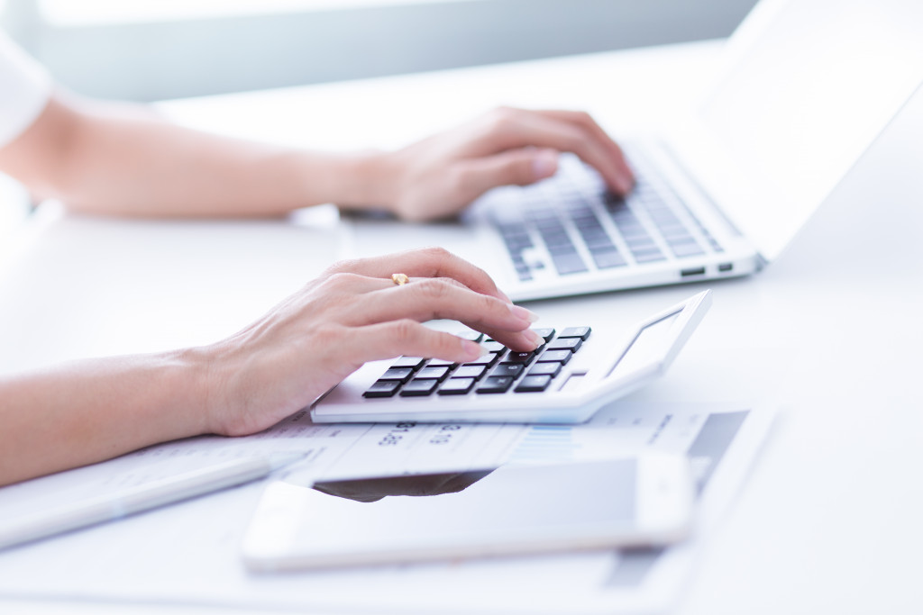 woman using a calculator