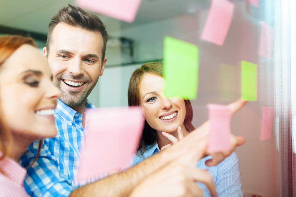 employees smiling to each other