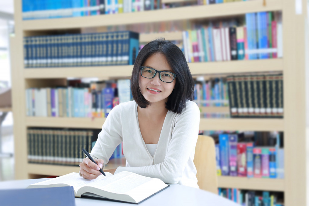 entrepreneur studying in the library