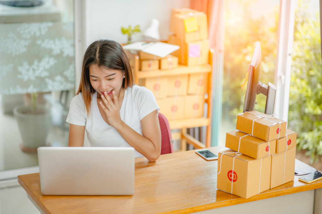 a woman working on her laptop