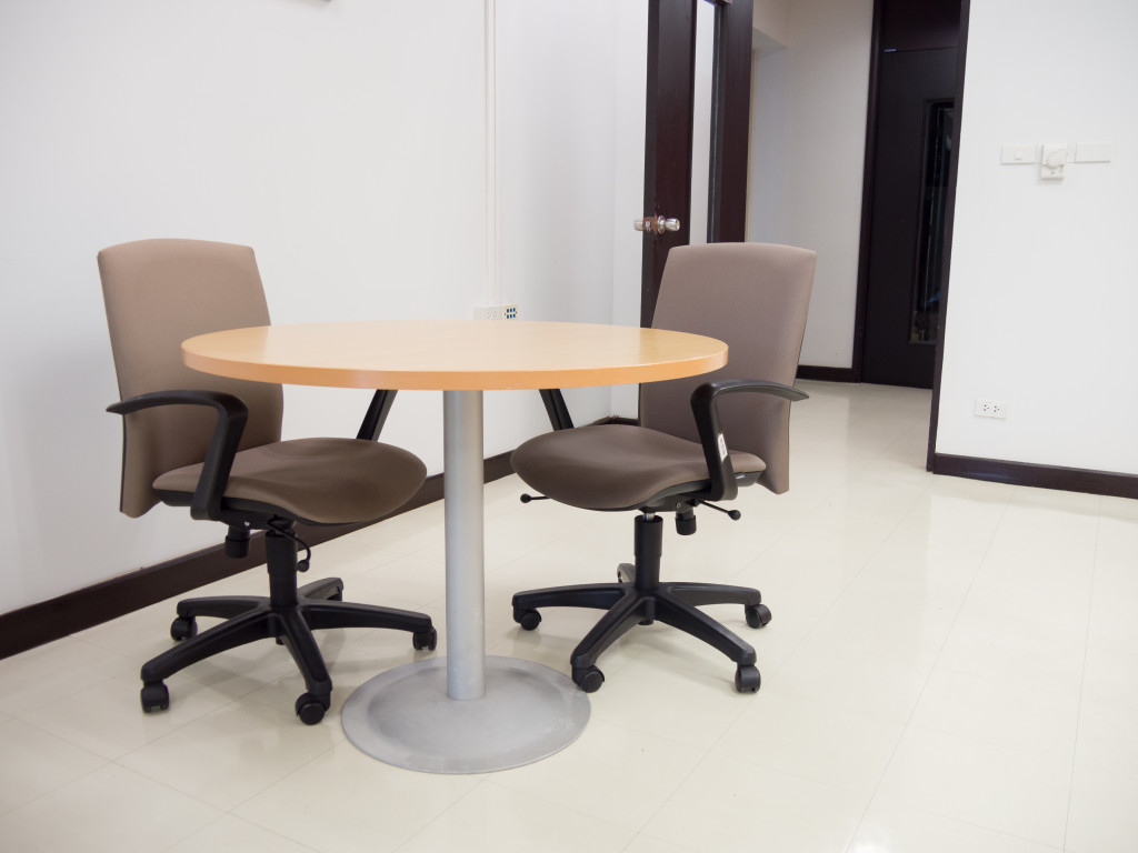 A break room with two chairs in the office