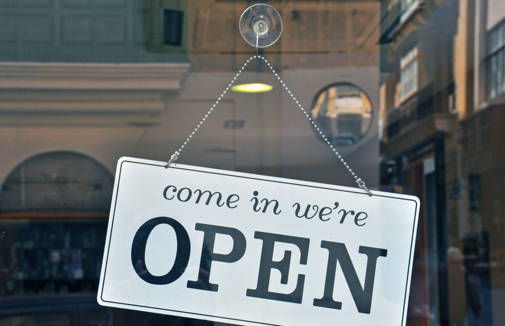 Open sign in street cafe