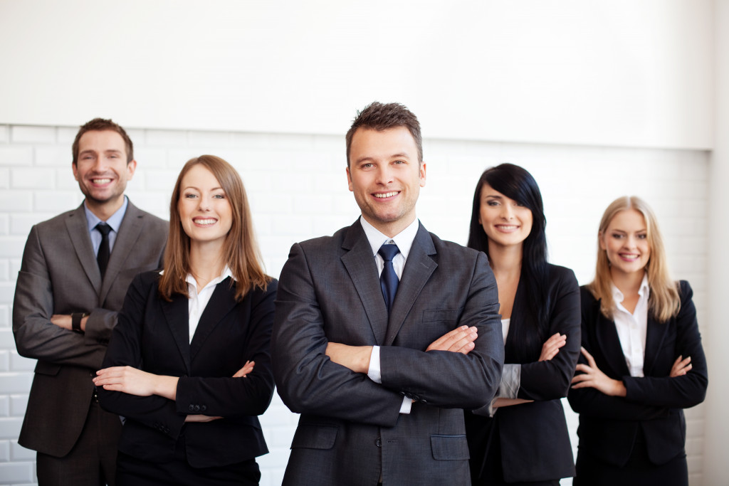 Group of business people with businessman leader on foreground