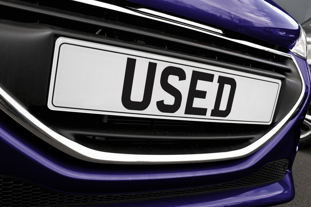 number plate used cars for sale on a purple car