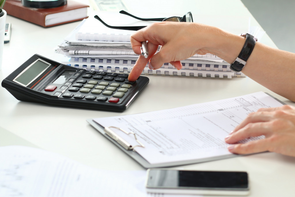 An accountant calculating finances in an office