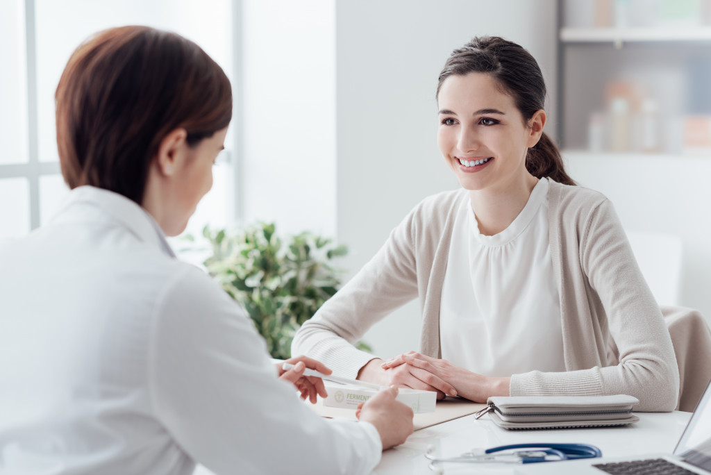 woman talking to a doctor