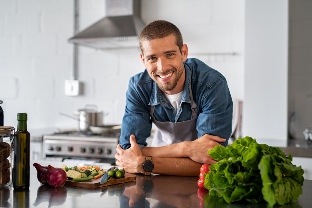 Chef in kitchen ready to work