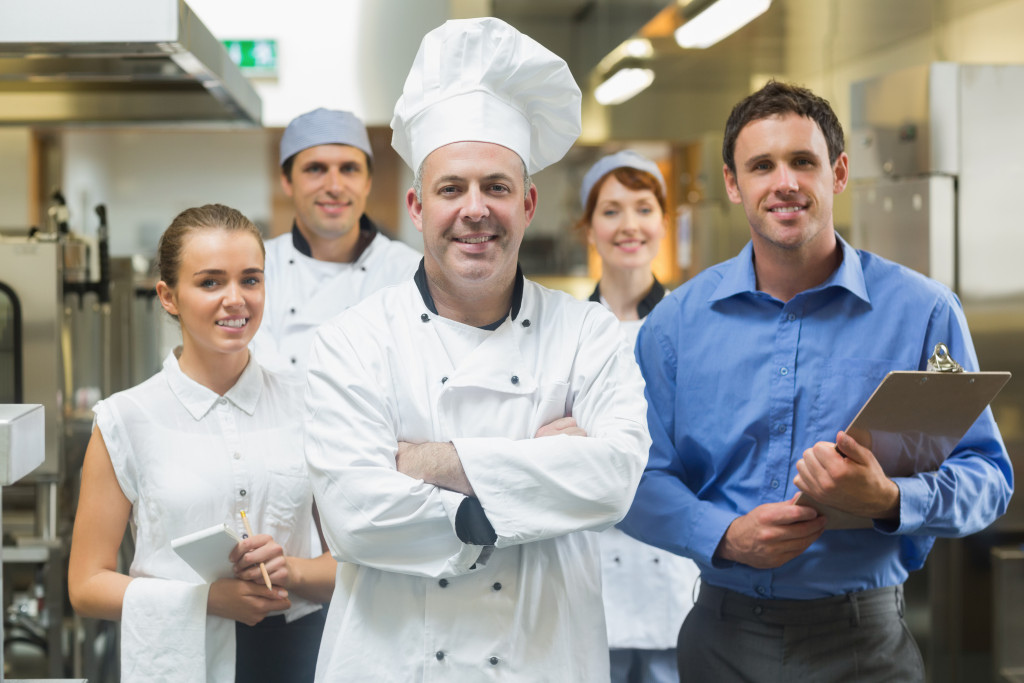 chef with his kitchen staff