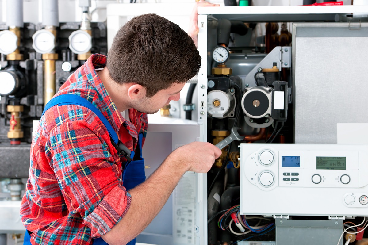 a man doing heating repair