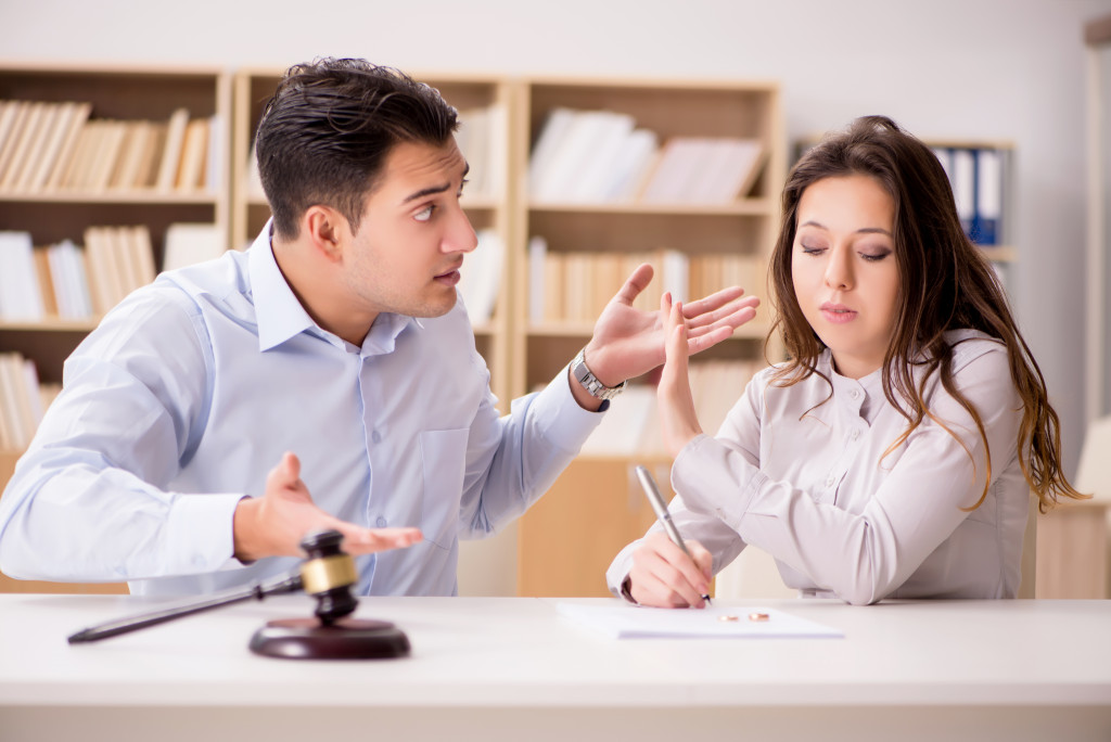 couple disagreement in front of their lawyer