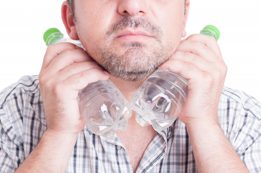 Employee and water bottles for cooling