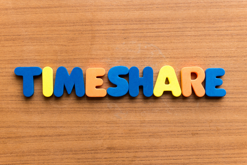 timeshare colorful word on wooden background