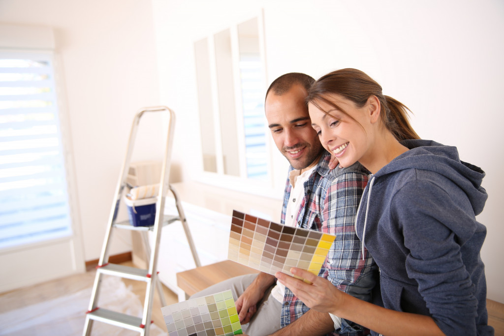 couple in a new house smiling