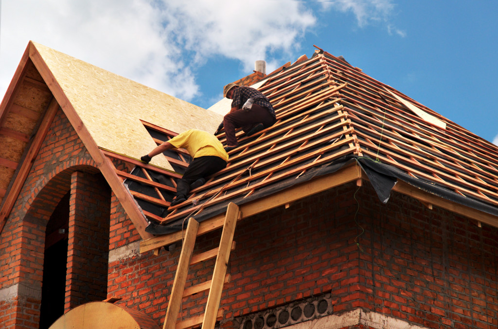 roofers in a home maintenance project