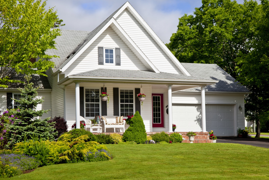 traditional house with landscaped yard