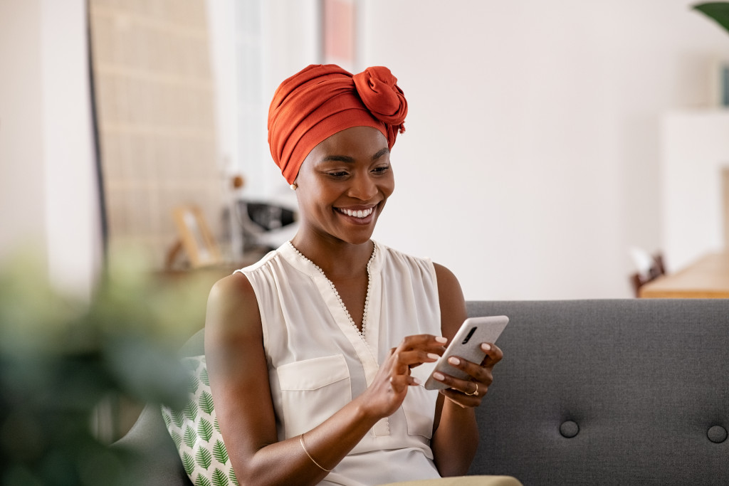 a smiling woman on a phone